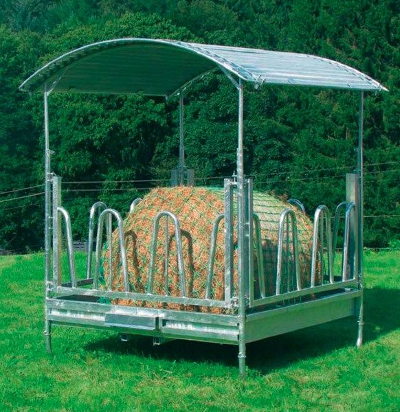 Futtersparnetz mit Rundballen im Quaderraufe